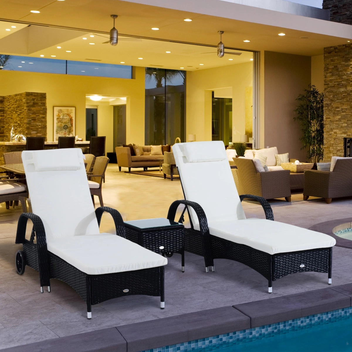 Stylish white chaise lounges by a luxurious poolside with a serene background.