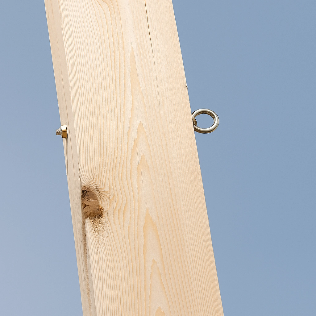 Installing heavy-duty hardware like eye bolts and pad eyes for secure shade sail attachment.