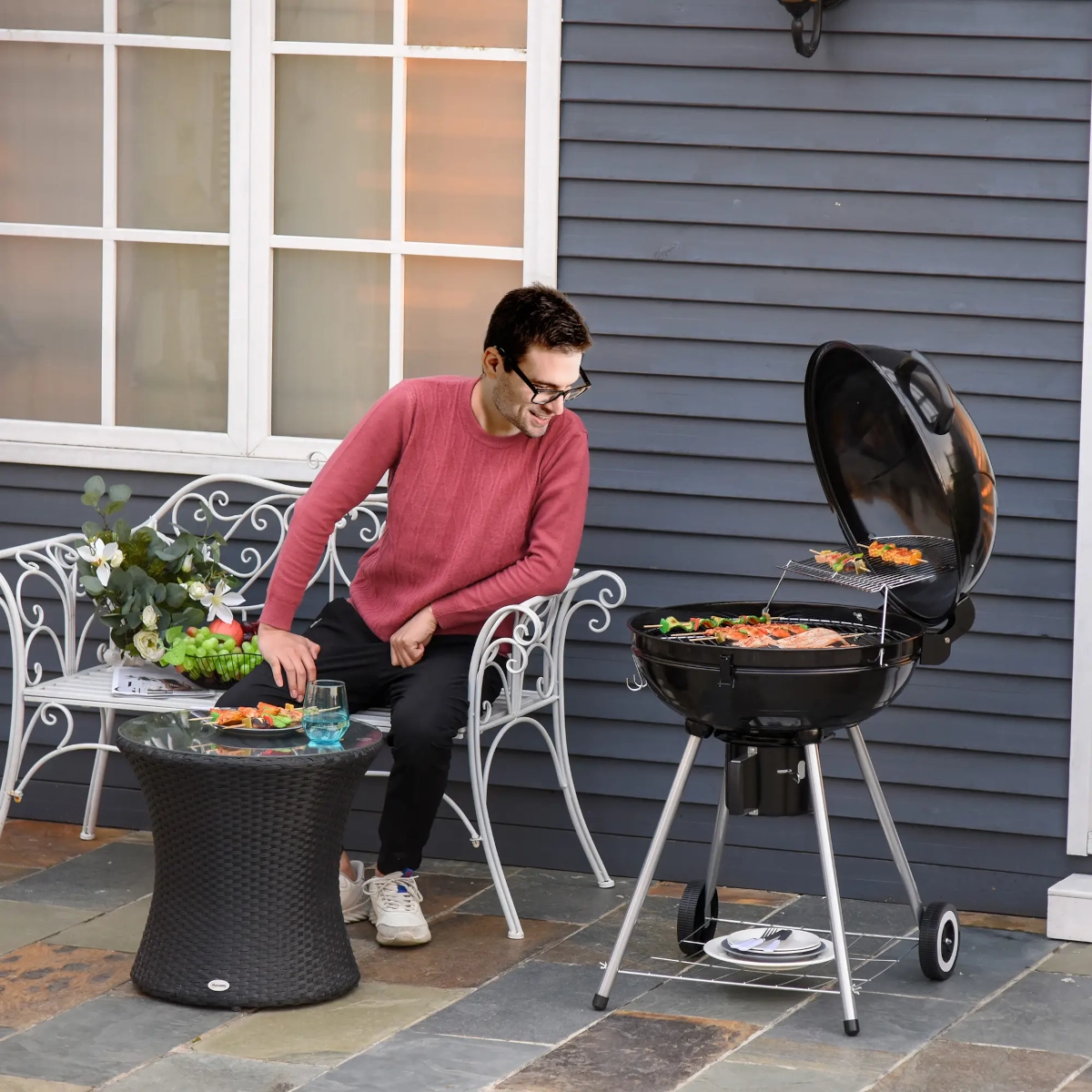 Classic kettle-style portable charcoal grill designed for outdoor cooking versatility.