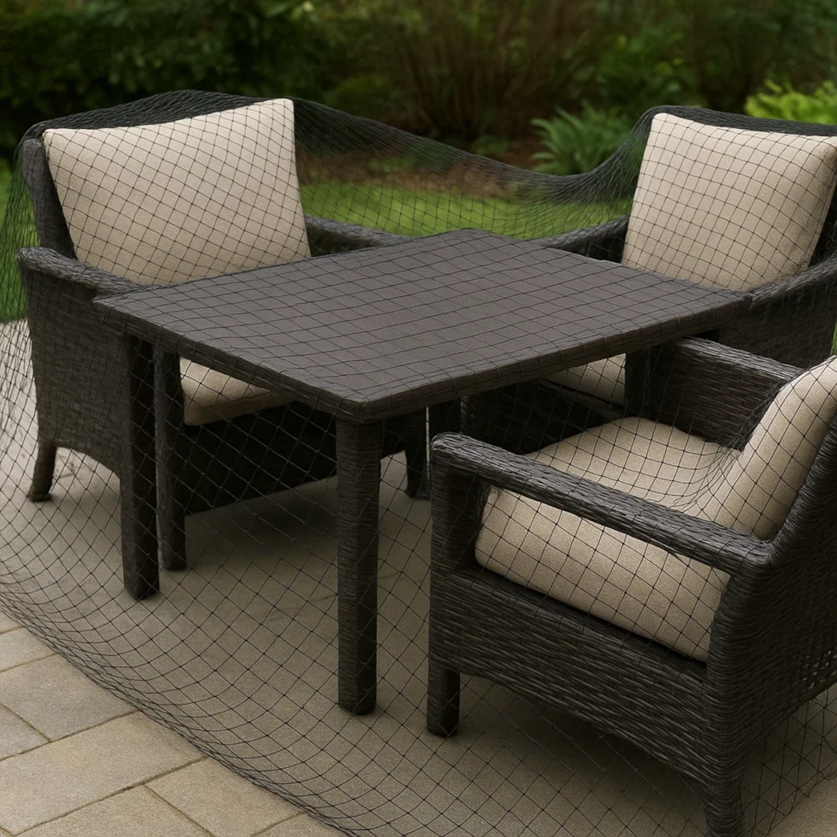 Fine mesh patio covers preventing birds from landing or nesting on outdoor furniture.