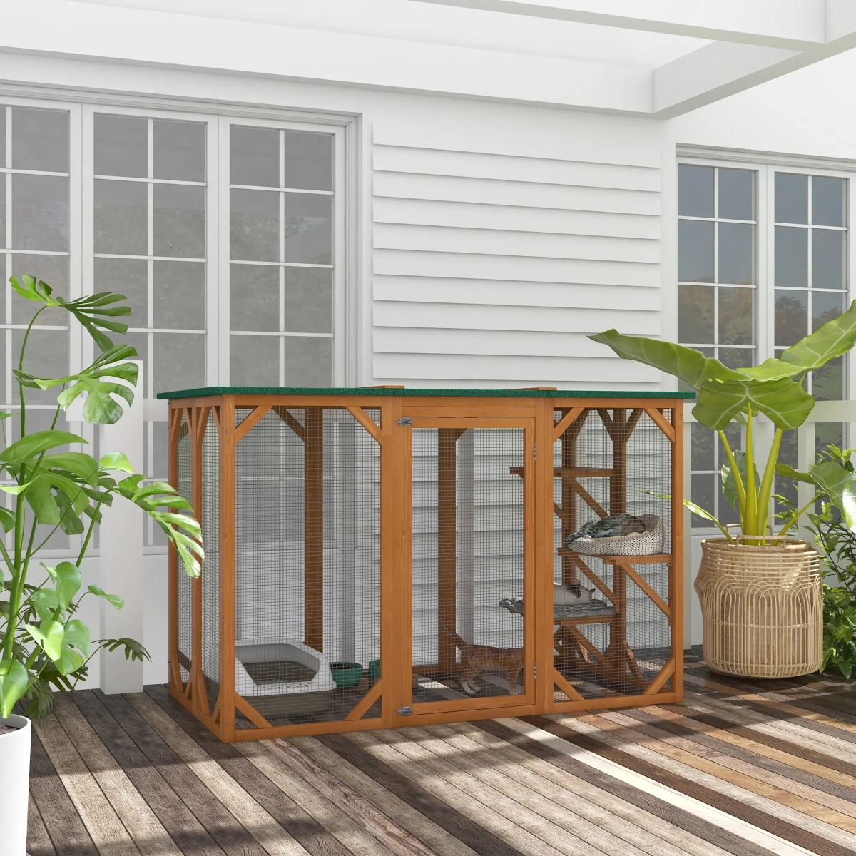 Safe outdoor cat enclosure providing space to play without accessing patio furniture