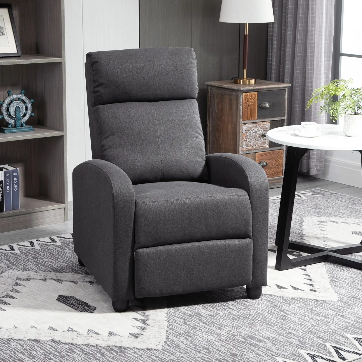 Recliner chair in a cozy living room, perfect for relaxation and comfort.