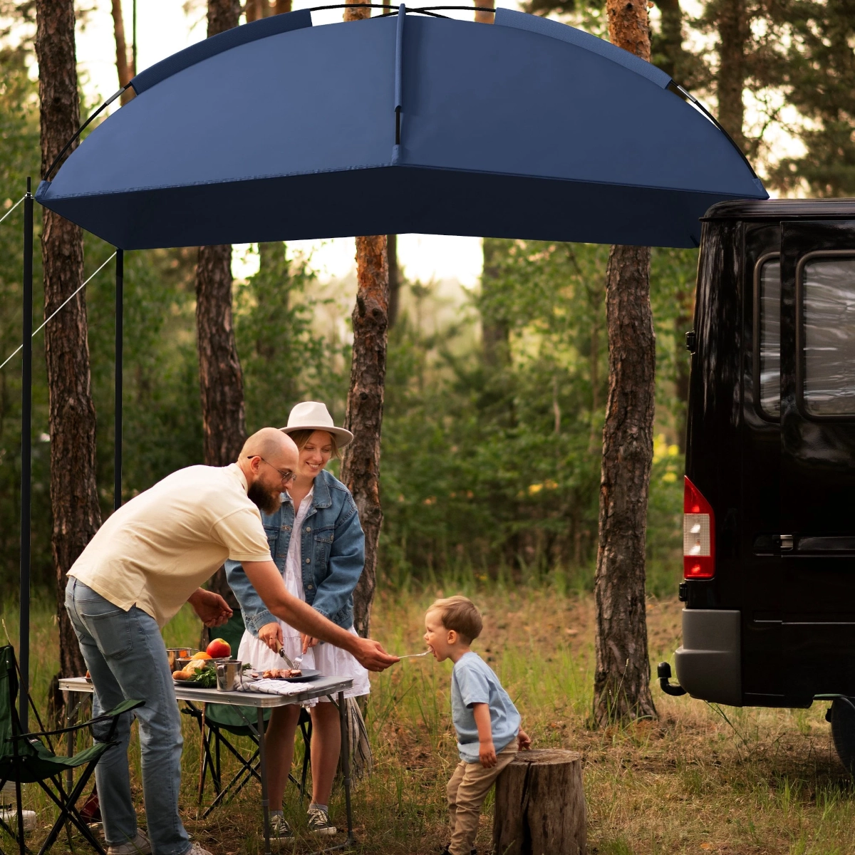 Rooftop tent mounted on vehicle with ladder, set up at remote outdoor location.