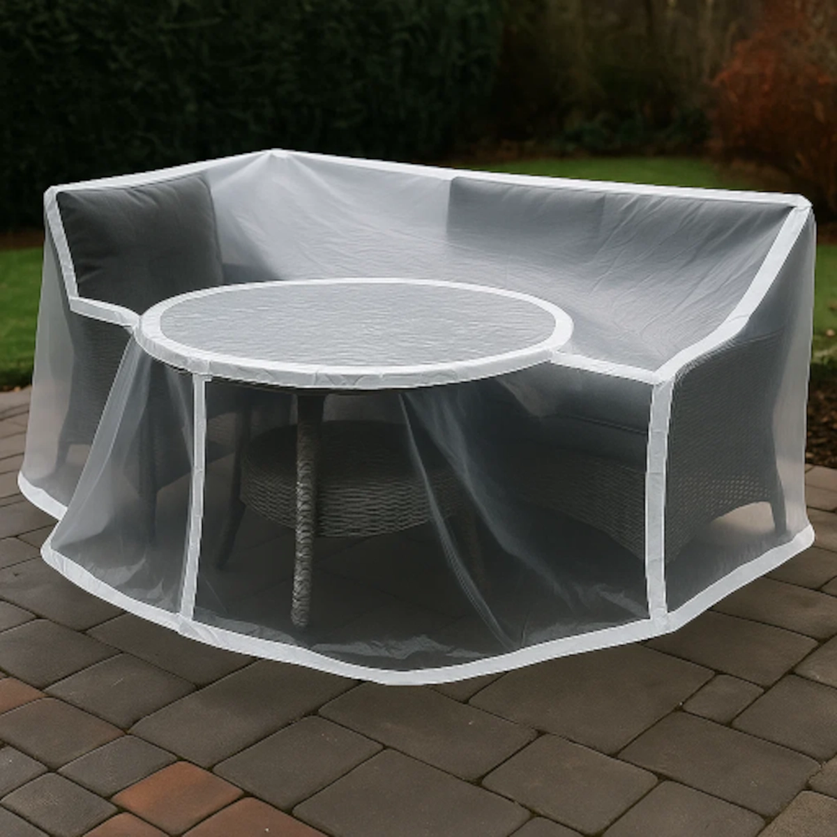 Shrink tape sealing edges of wrap on patio furniture for secure, weather-resistant coverage.