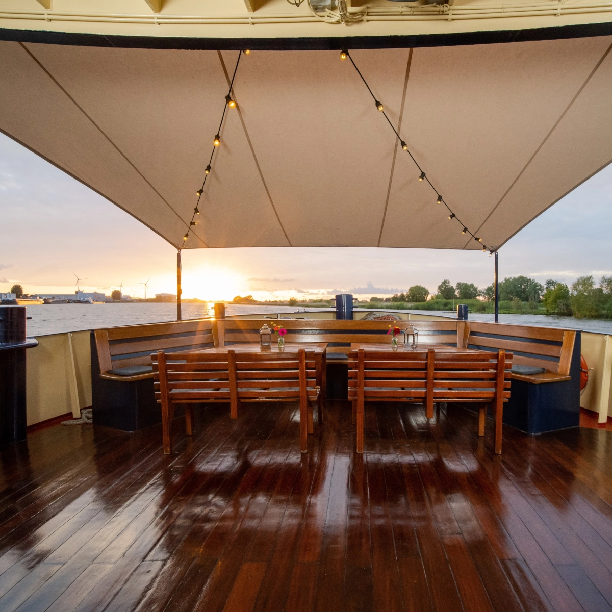 Waterproof shade sail installed on boat deck, highlighting strong weather resistance features.