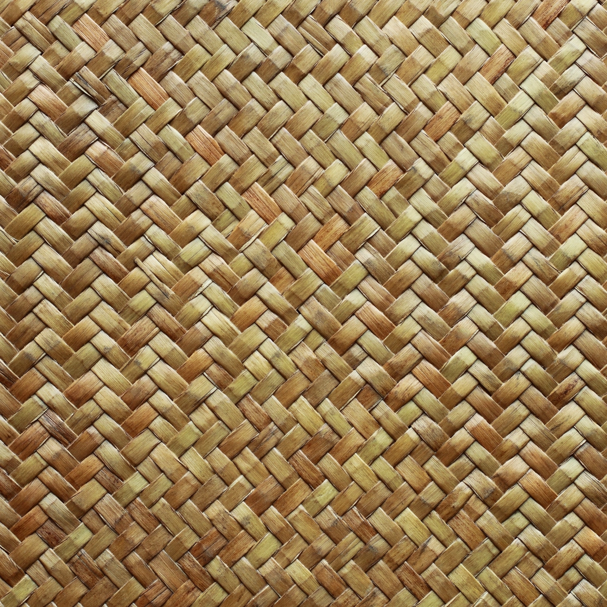 Close-up of wicker weave showing synthetic pattern used in outdoor furniture sets.