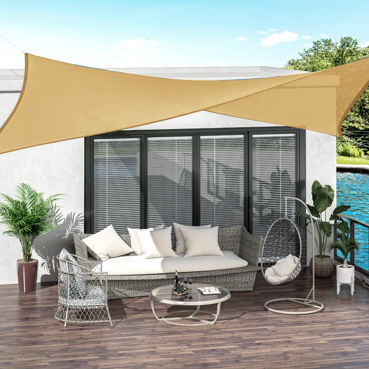 Overlapping beige shade sails providing stylish sun protection in modern outdoor setting.