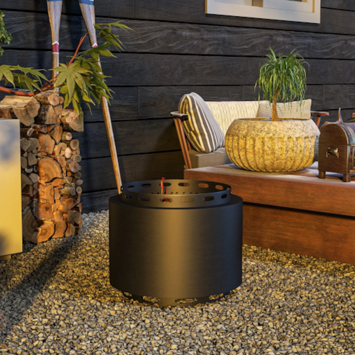 Outdoor patio with cozy seating, stacked firewood, and a black metal wood-burning fire pit.