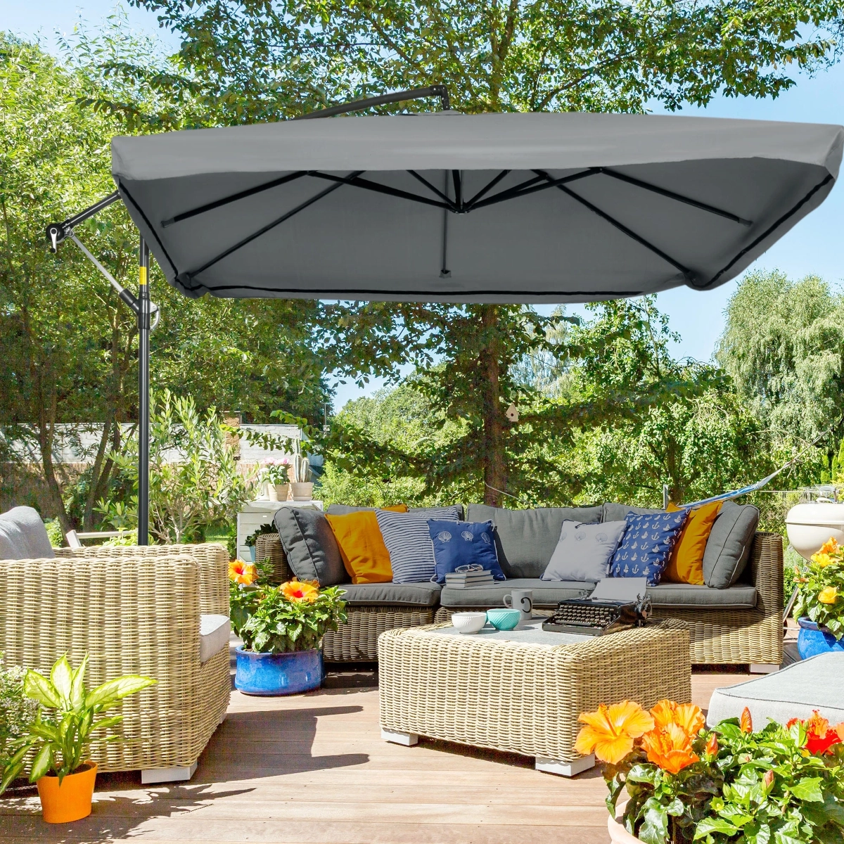 Oversized outdoor patio umbrella covering wide seating area on spacious patio.