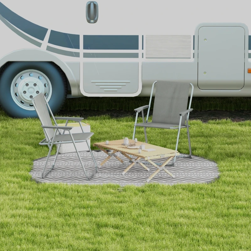 Foldable camping chair with padded armrests, drink holder, and mesh back for ventilation.