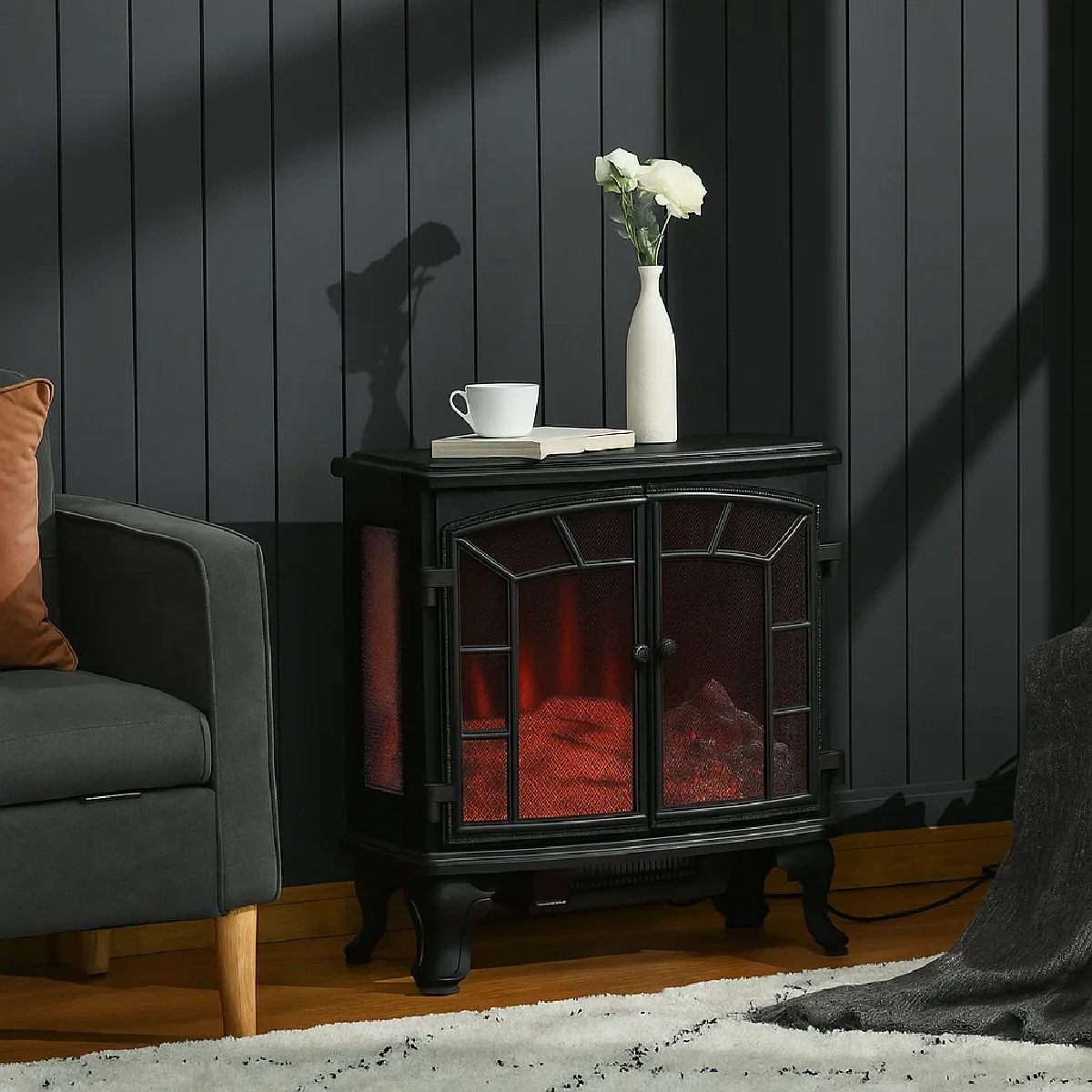 Electric fireplace with a soft beige wall and classic trim, styled with a vase and coffee cup for contrast.
