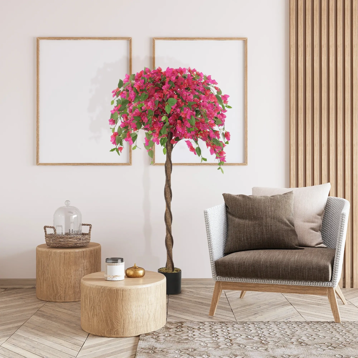 Artificial pink flowering tree in a modern living room with stylish wooden decor and a cozy chair.