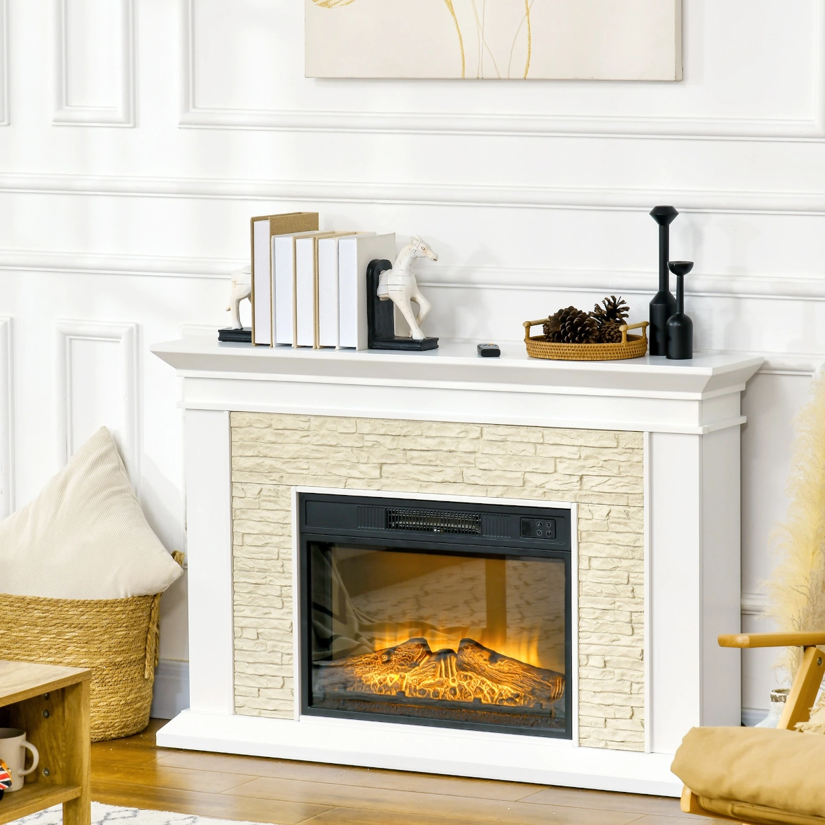 White electric fireplace with mantel, remote control, and home décor in a modern bright-walled room.