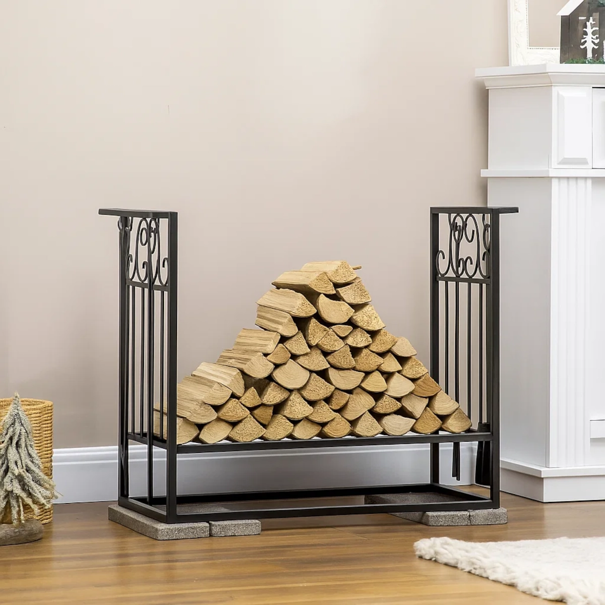 Neatly stacked firewood arranged in triangle shape on metal rack indoors.