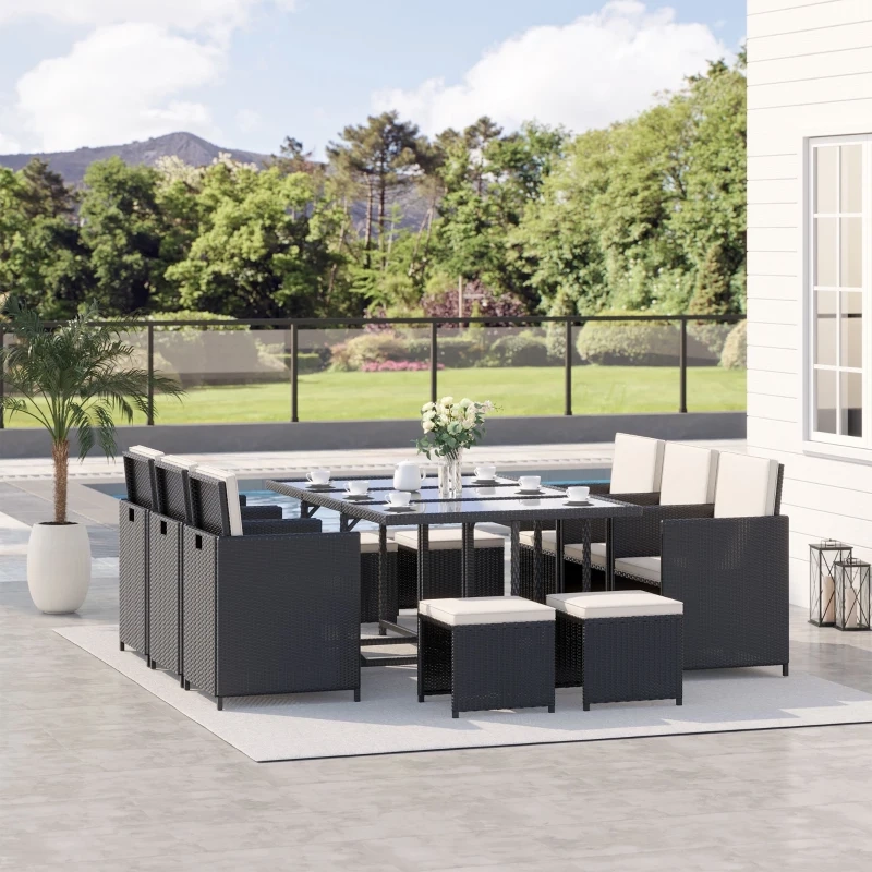 Spacious outdoor wicker dining set with footstools and corner seating for large gatherings