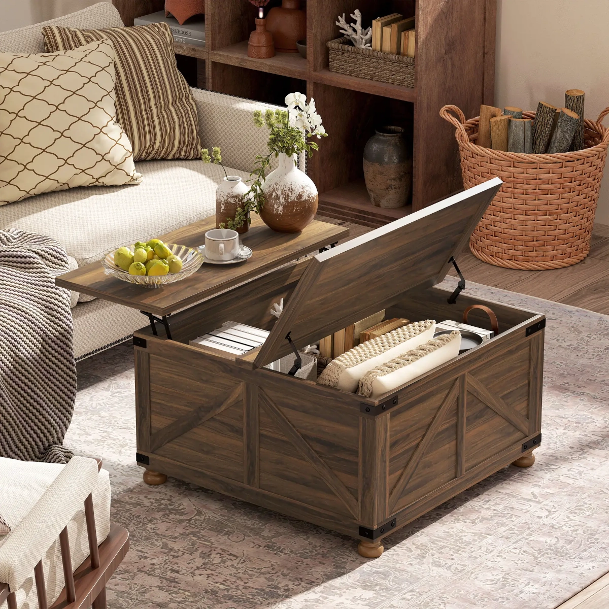 Wooden lift-top coffee table opened to reveal storage with folded blankets, trays, and books.