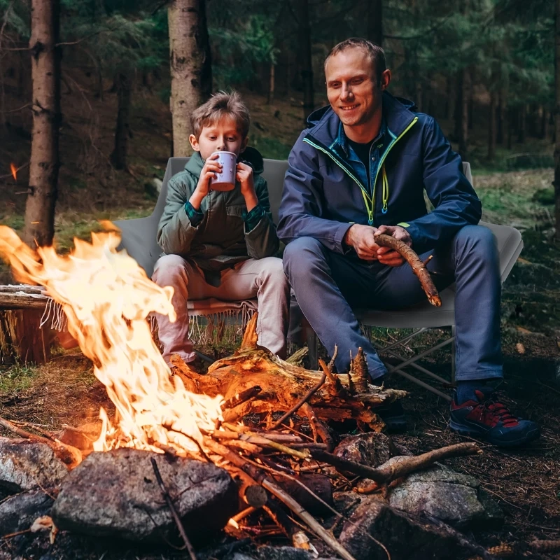 Extra-wide padded loveseat camping chair for cozy outdoor lounging.