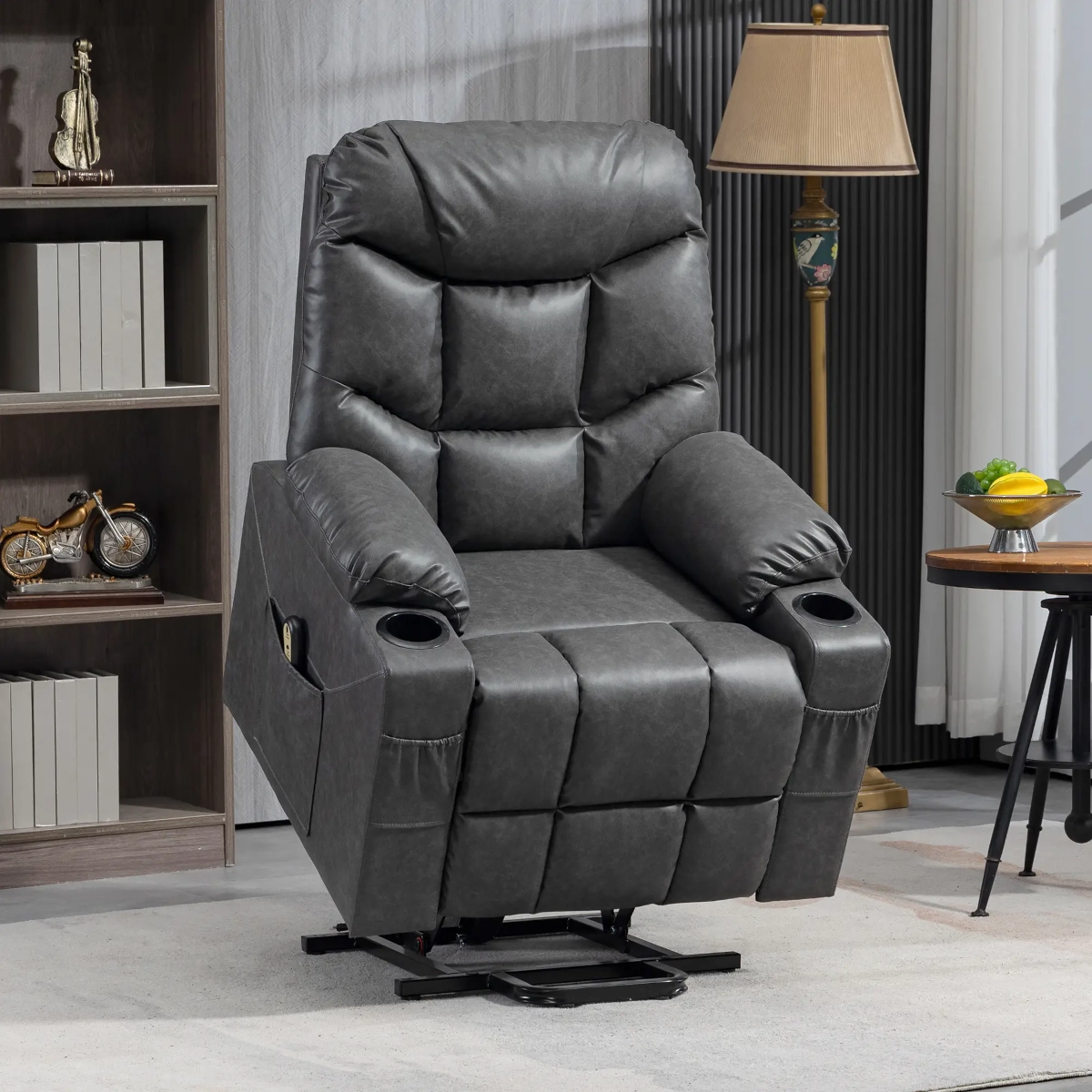 Large black leather recliner chair with cup holders and plush cushions in a modern home.