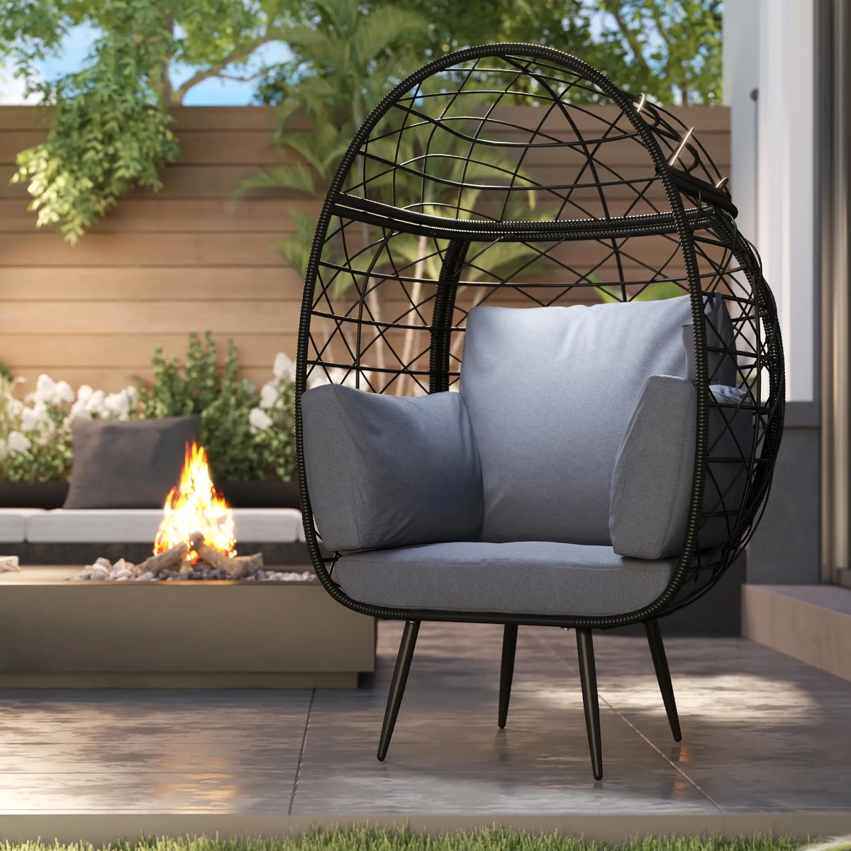 Durable PE rattan egg chair with weather-resistant frame for stylish outdoor seating comfort.