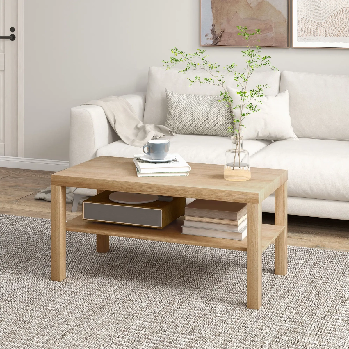 Simple wooden rectangular coffee table with lower shelf holding books and a storage box.