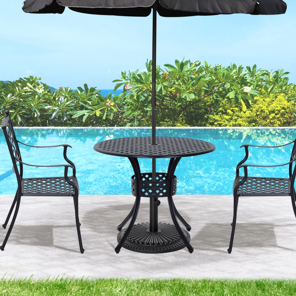 Circular patio dining table with umbrella hole and mesh chairs for shaded outdoor dining