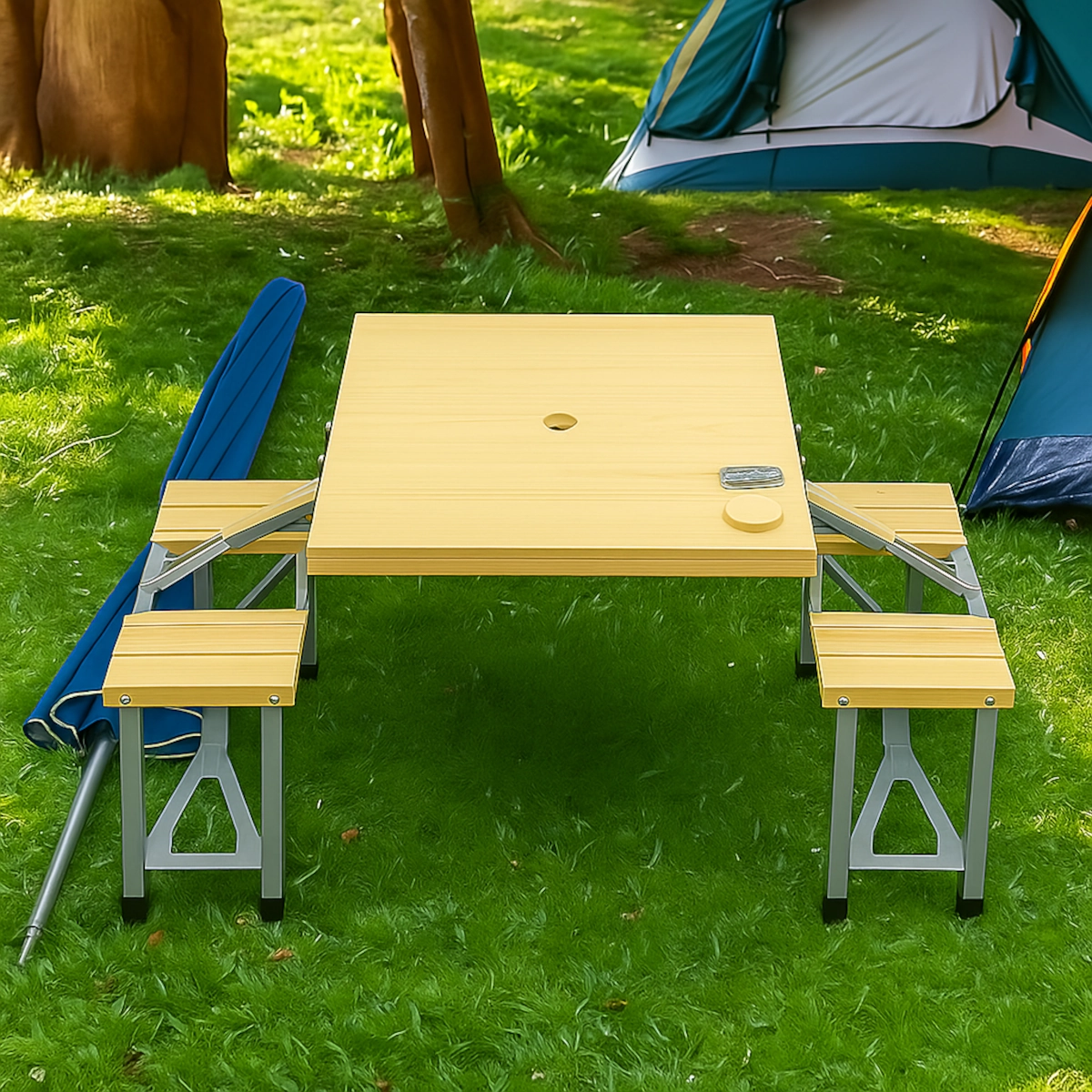 Picnic table frame standing on lawn with umbrella removed