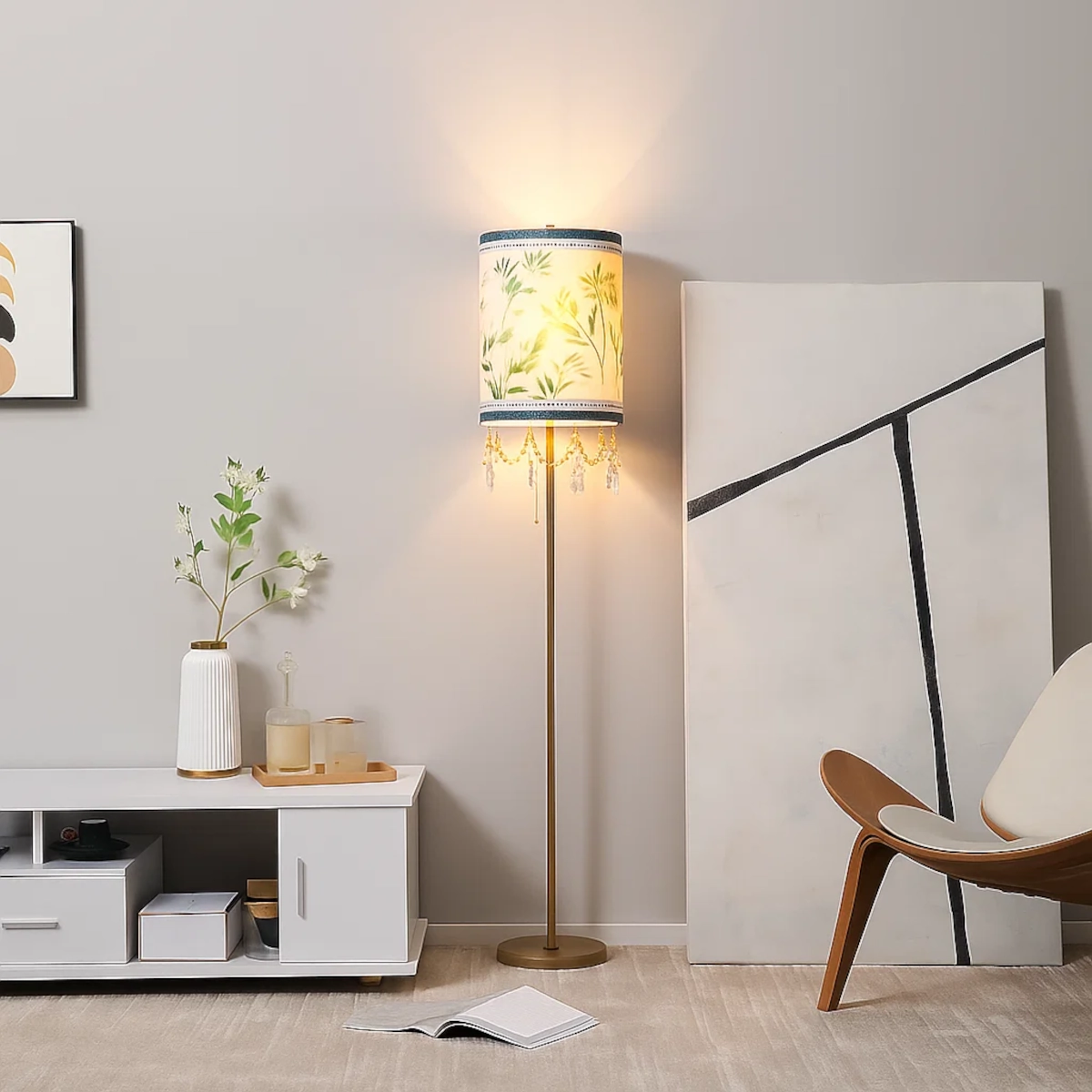 Floor lamp decorated with crystals and hanging accents, adding sparkle and playful character to the space.