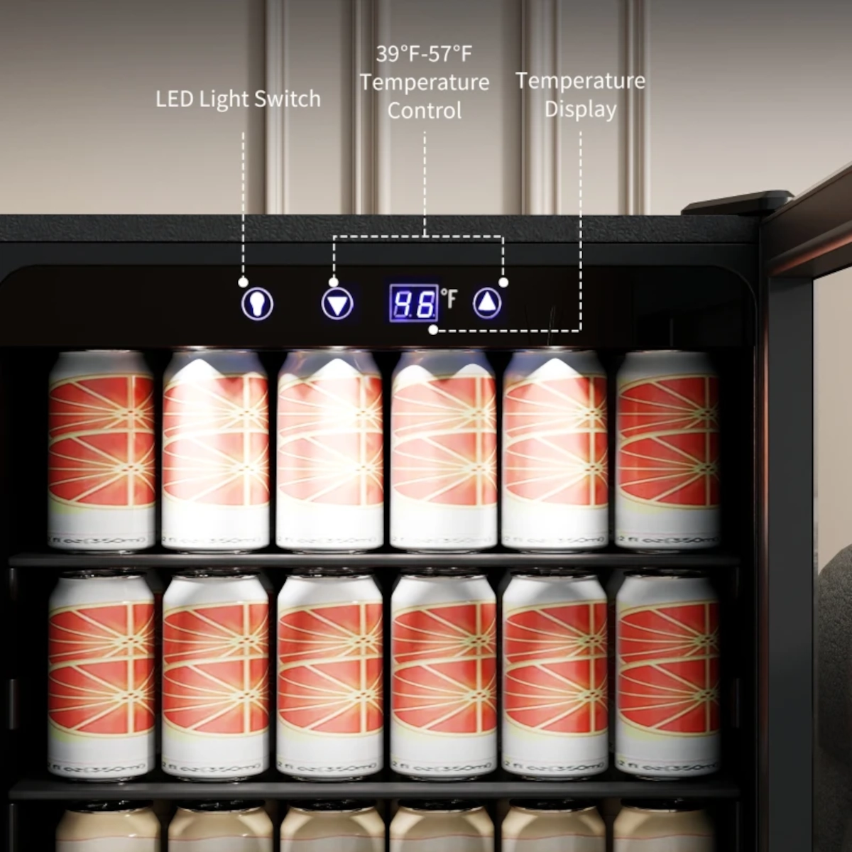 Close-up of fridge control panel with LED temperature display and buttons for adjustments.