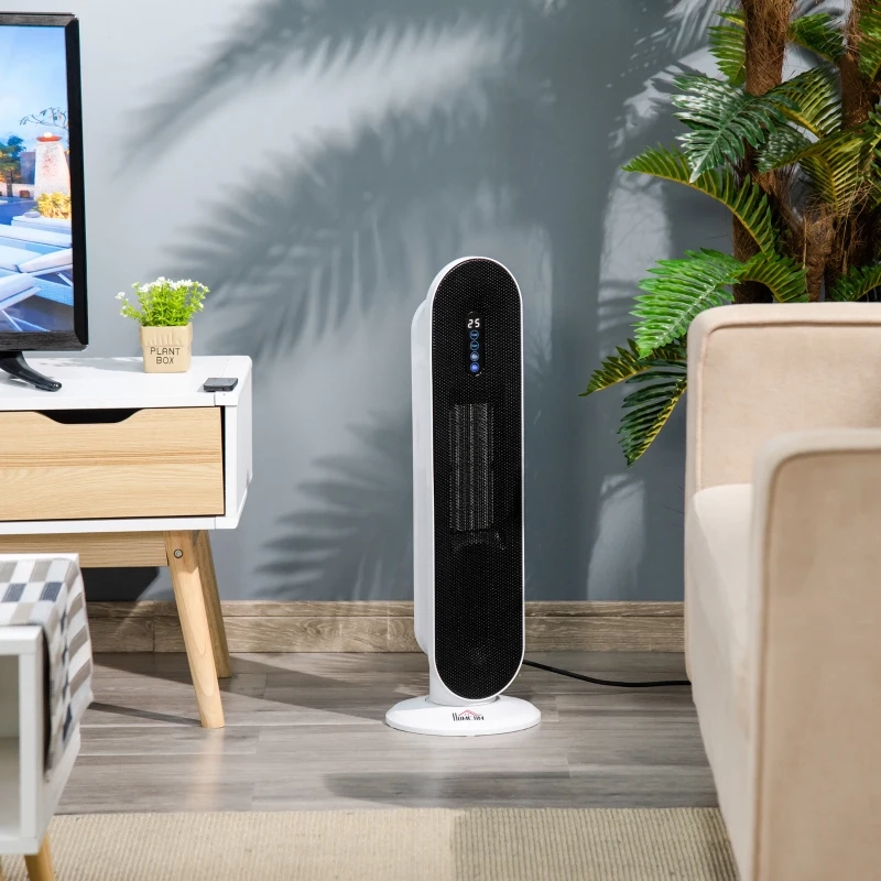 Tower heater in a modern living room beside a TV stand and indoor plants.