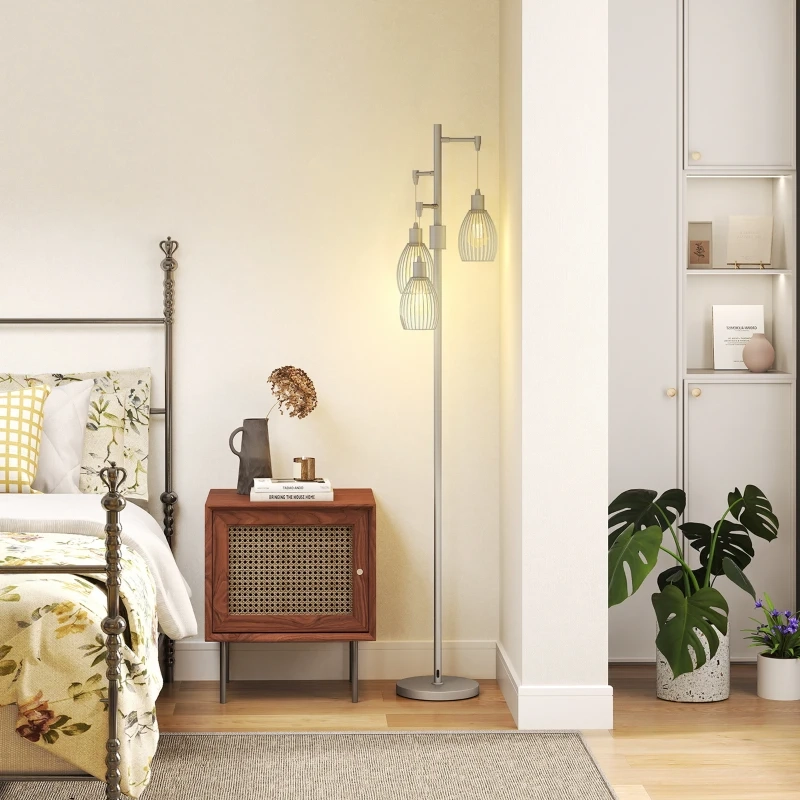 Bedroom with floor lamp featuring three hanging lights beside nightstand and bed.