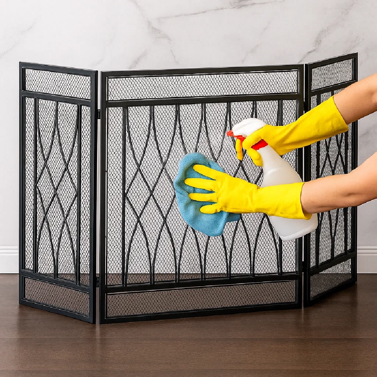 Person spraying and wiping a fireplace screen, showing tips for safety and longevity.