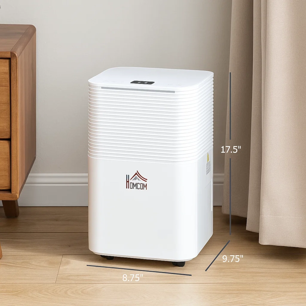 White HOMCOM dehumidifier with dimensions displayed, placed beside curtain and wooden nightstand.