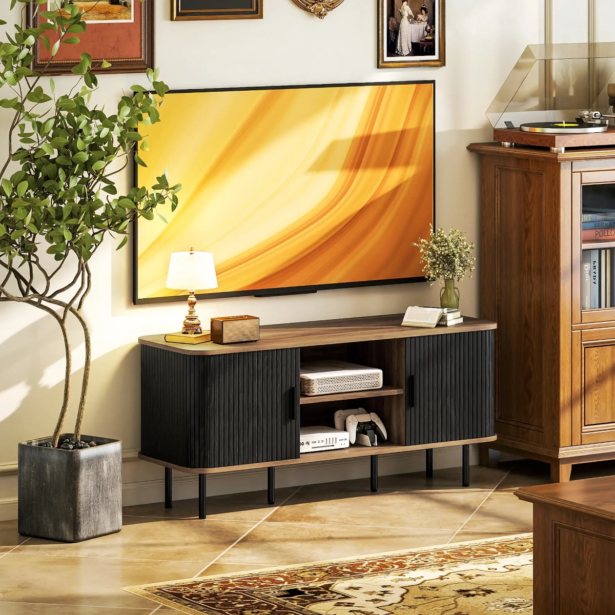 Curved-edge mid-century modern TV stand with slatted doors and display decor under a wall-mounted TV.