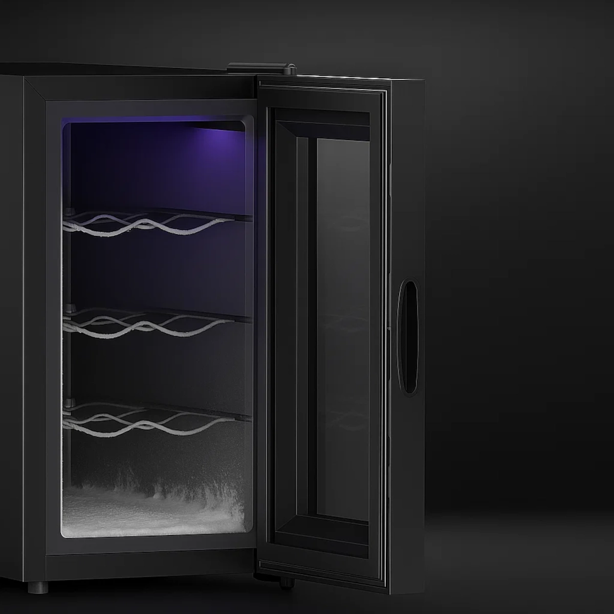 Wine fridge emptied of bottles with frost remaining inside.