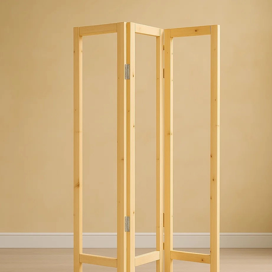 Three-panel wooden frame divider with hinges before fabric installation.
