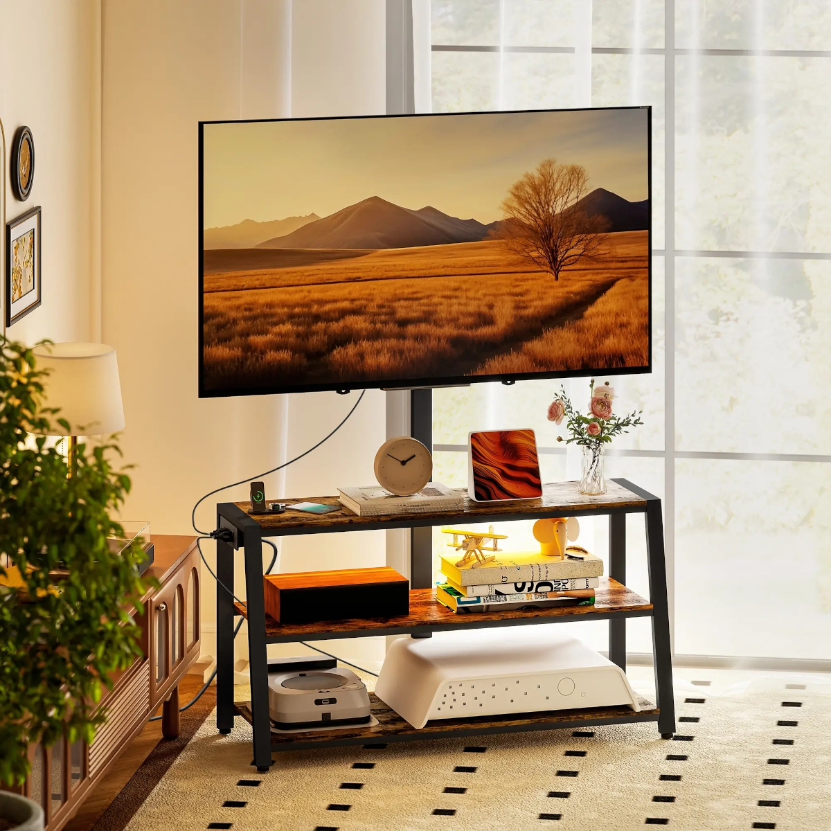 Compact TV stand with mounted screen, open wood shelving, and decorative accessories in a cozy living room.