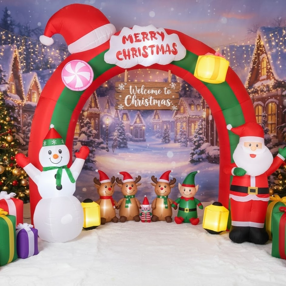 Santa and snowman inflatable arch displayed indoors with festive props